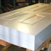 Image of Stack of finished metal doorskins at Samuel Stamping